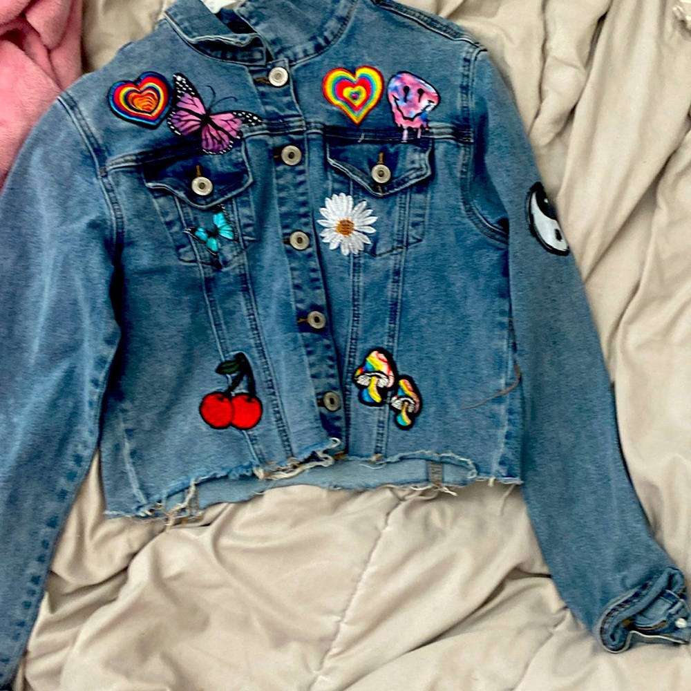 i am selling this colorful jean jacket